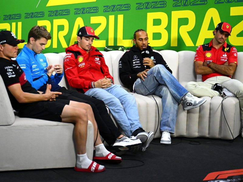 SAO PAULO, BRAZIL - NOVEMBER 02: Lewis Hamilton of Great Britain and Mercedes talks in the Drivers Press Conference as Valtteri Bottas of Finland and Alfa Romeo F1, Logan Sargeant of United States and Williams, Charles Leclerc of Monaco and Ferrari and Carlos Sainz of Spain and Ferrari look on during previews ahead of the F1 Grand Prix of Brazil at Autodromo Jose Carlos Pace on November 02, 2023 in Sao Paulo, Brazil. (Photo by Clive Mason/Getty Images)